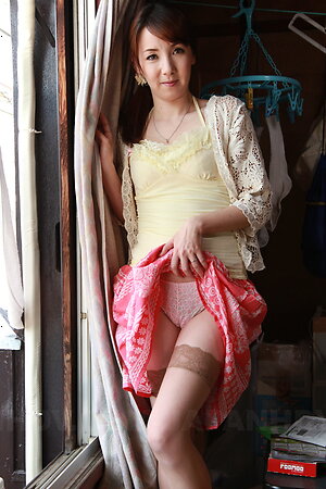 Japan Chika Sasaki strips to show round boobs and hairy love box.