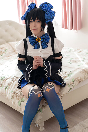 ?ute Japanese girl Mari Hirose in a schoolgirl costume poses on the street and at home, exposing her shaved pussy and ass