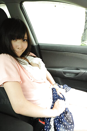 Nasty Riko Tabe shows hairy pussy and sucks a cock in the car.